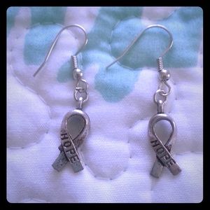 3/$15 Breast Cancer Awareness earrings.